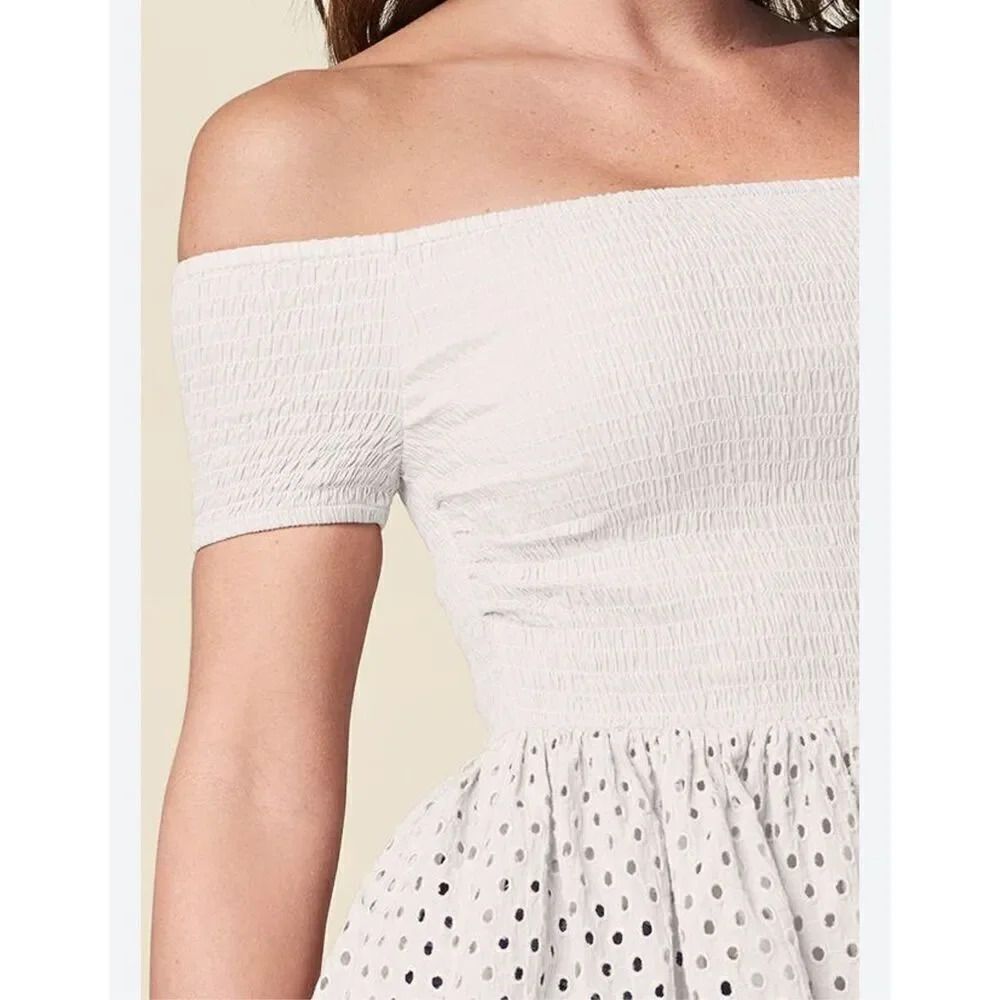Venus S shocked white off shoulder peplum w- eyelet hi low hem